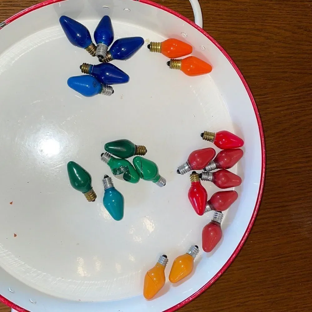 Collection of 21 painted‎ Christmas lamp bulbs/various colors